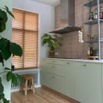 Sfeervolle keuken met mooie kleuren en materialen in Renkum.